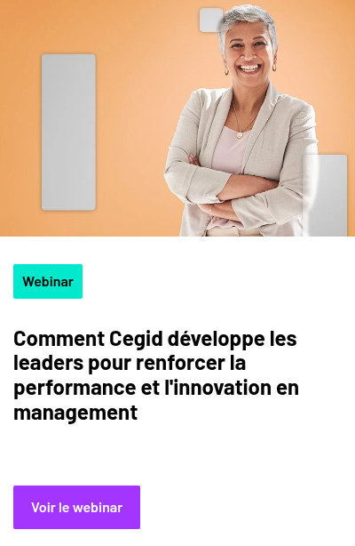 Person standing against an orange background, smiling with arms crossed, dressed in a light-colored blazer and top