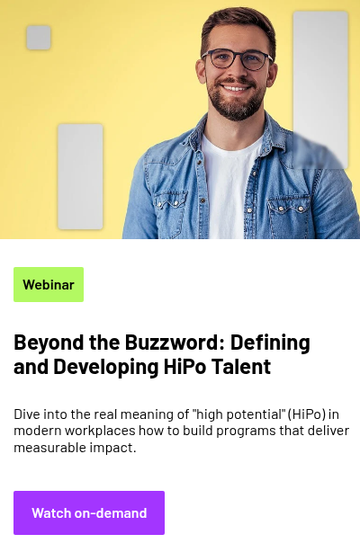 A person wearing a denim jacket over a t-shirt, with four rectangular shapes of varying sizes positioned around them.