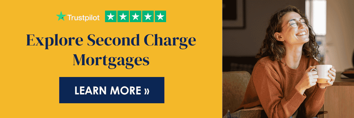 A happy woman in her home following a successful home improvement project. Click to explore second charge mortgages.